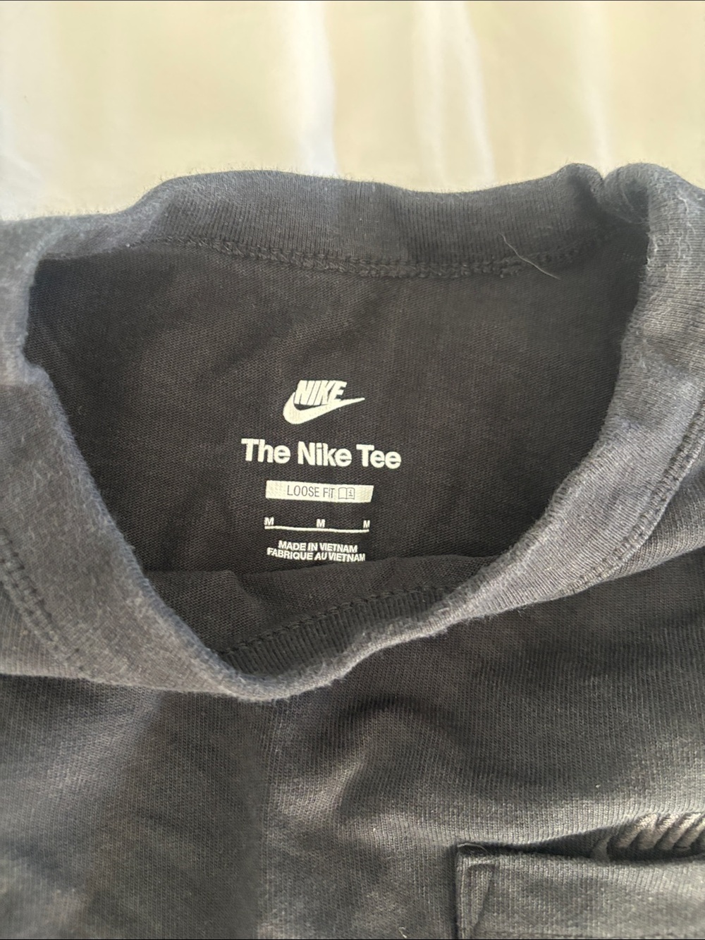Nike Black Crewneck long sleeve tee with Subtle Logo at breast pocket